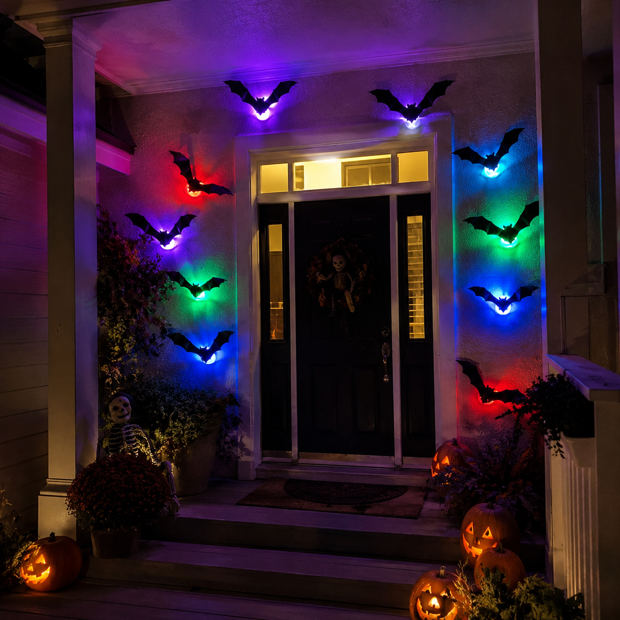 Colorful illuminated bat decorations around a home hallway entrance